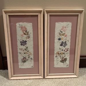 Set of 2 floral wall decor. Cream colored frame, with pink/mauve background.